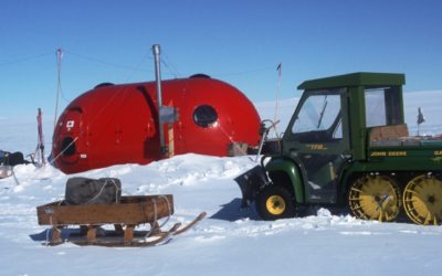 A truck that is sitting in the snow.